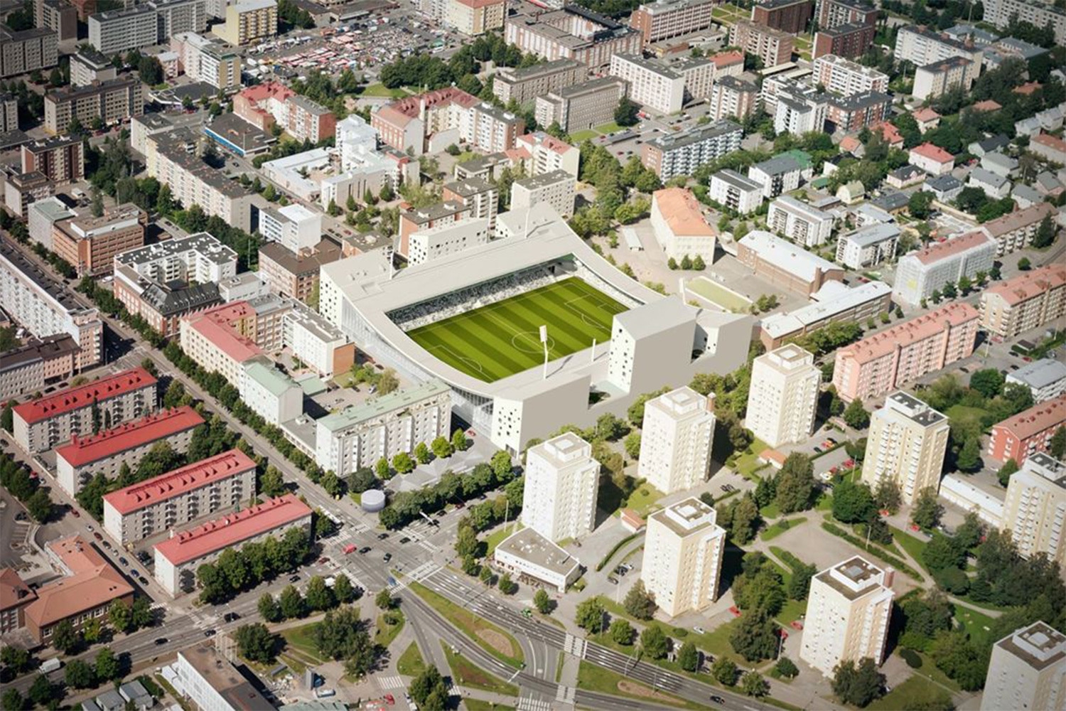 Tammelan stadion havainneilmakuvassa. Kentän kummallakin puolella asuinkerroksia.